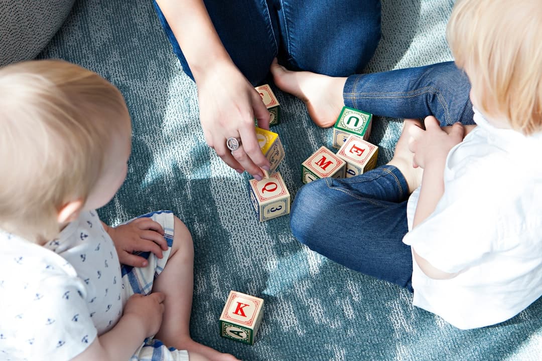 Caregiver and children at play